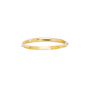 14kt petite bangle with white gold nail head